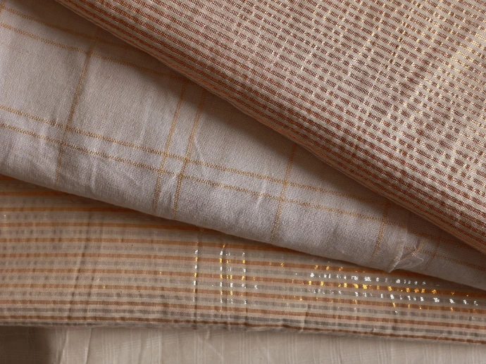 Gold glitter fabrics sourced by ATELIER A.PUUR.A 